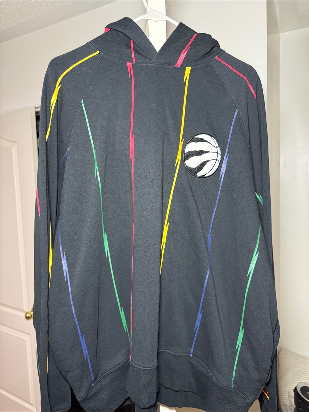 Black Raptors Hoodie with Multi-Color Lightning Stripe and Basketball Patch